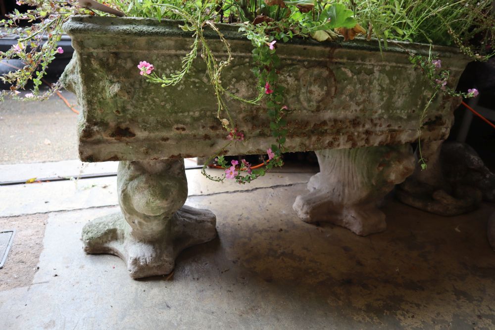 A reconstituted stone rectangular garden planter on trestle stand, length 92cm height 58cm